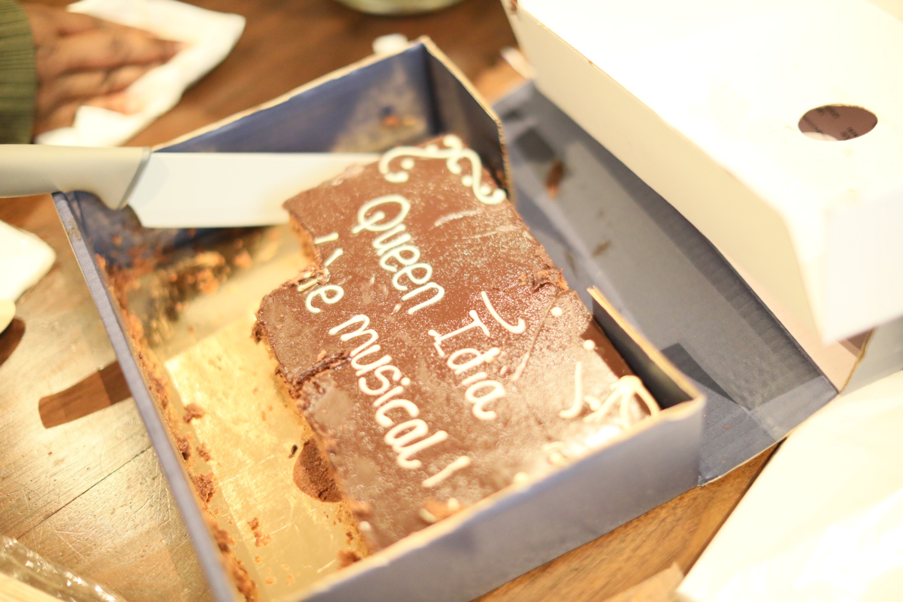 Chocolate cake iced with 'Queen Idia the Musical'